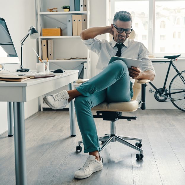 A man living working alone in an active and dynamic space